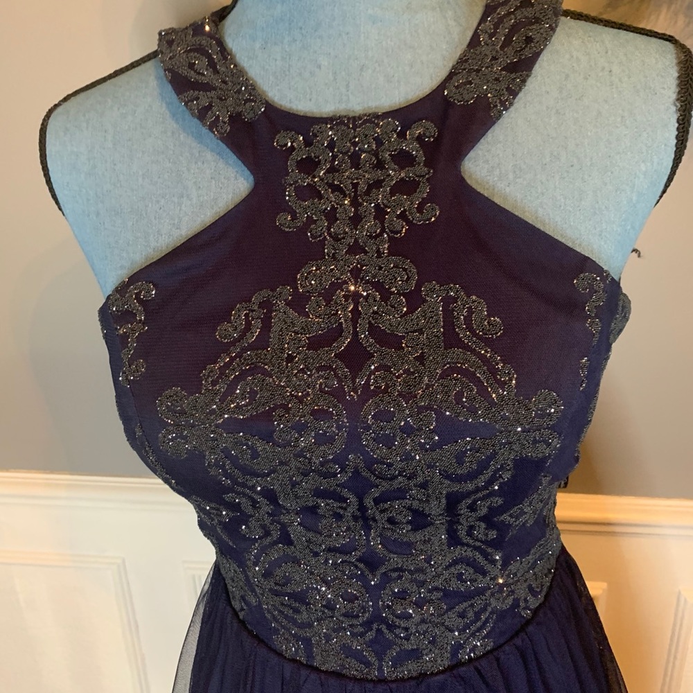 Beautiful sparkly blue party With open back. 5 Jr.